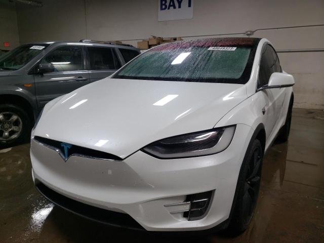 TESLA MODEL X 2017 with VIN 5YJXCBE24HF079245 - Photo from auction