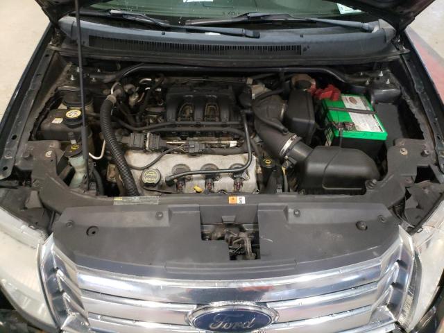 Photo 12 from auction – 2008 FORD TAURUS X S with VIN 1FMDK05W98GA39337