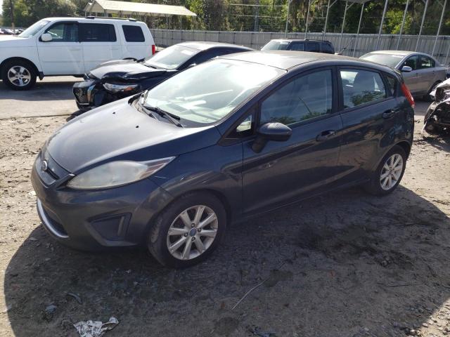 FORD FIESTA SE 2011 with VIN 3FADP4EJ0BM137502 - Photo from auction