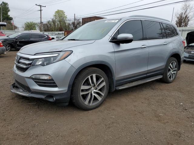 HONDA PILOT TOUR 2017 with VIN 5FNYF6H98HB062346 - Photo from auction
