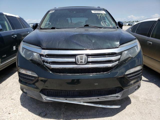 Photo 5 from auction – 2016 HONDA PILOT ELIT with VIN 5FNYF6H04GB057287