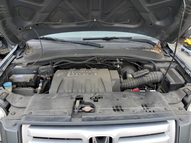 Photo 12 from auction – 2006 HONDA PILOT LX with VIN 5FNYF28136B031442