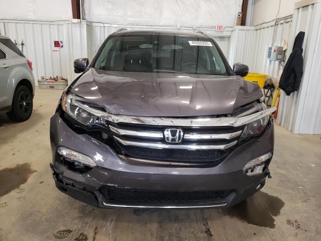 Photo 5 from auction – 2017 HONDA PILOT TOUR with VIN 5FNYF6H91HB062236