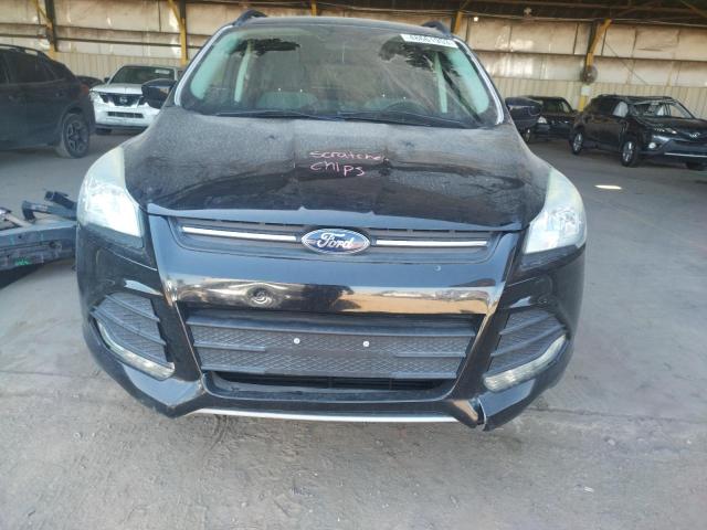 Photo 5 from auction – 2016 FORD ESCAPE SE with VIN 1FMCU9GX6GUA98782