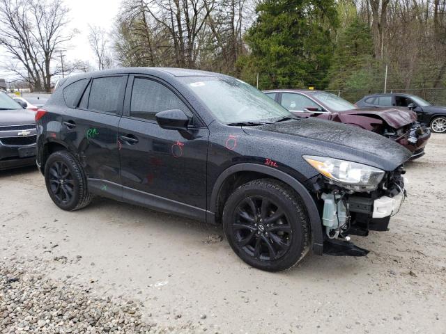 Photo 4 from auction – 2014 MAZDA CX-5 GT with VIN JM3KE2DY9E0338047