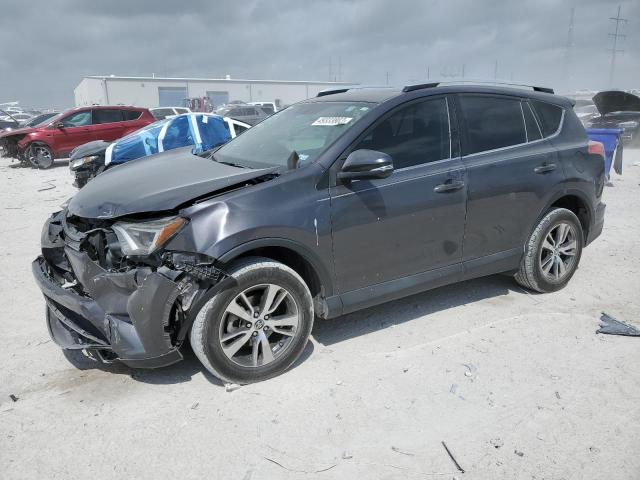 TOYOTA RAV4 XLE 2016 with VIN 2T3WFREV0GW297438 - Photo from auction