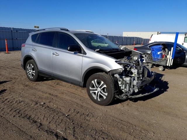 Photo 4 from auction – 2018 TOYOTA RAV4 LE with VIN JTMBFREV3JJ211589