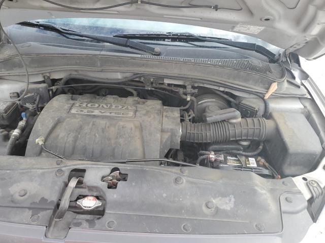 Фото 12 с аукциона – 2005 HONDA PILOT с VIN 5FNYF18555B013505