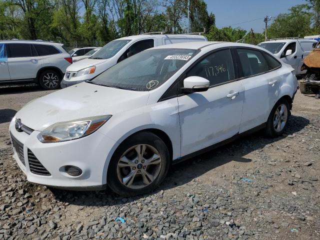 FORD FOCUS SE 2014 con VIN 1FADP3F20EL127401 - Foto de la subasta
