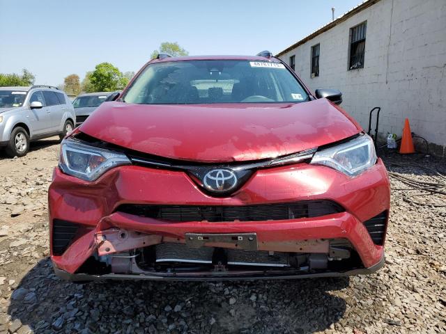 Photo 5 from auction – 2018 TOYOTA RAV4 LE with VIN 2T3BFREV4JW819672