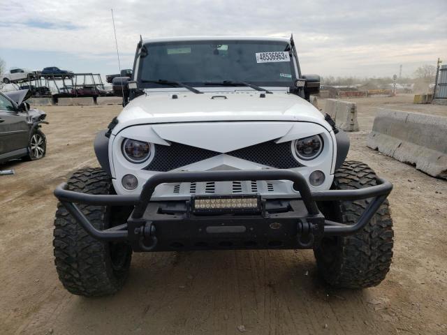 Photo 5 from auction – 2015 JEEP WRANGLER U with VIN 1C4BJWDG4FL577105