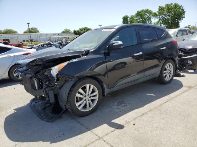 HYUNDAI TUCSON GLS 2012 with VIN KM8JUCAC3CU350007 - Photo from auction