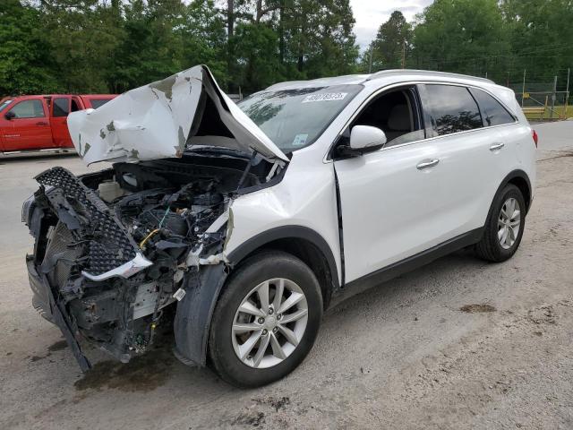 KIA SORENTO LX 2016 with VIN 5XYPG4A36GG051940 - Photo from auction