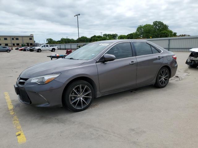 TOYOTA CAMRY LE 2017 with VIN 4T1BF1FKXHU774164 - Photo from auction