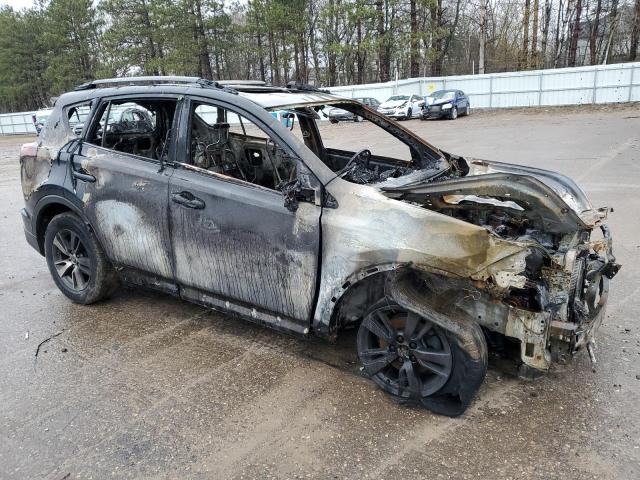 Photo 4 from auction – 2017 TOYOTA RAV4 XLE with VIN JTMWFREV6HD101579