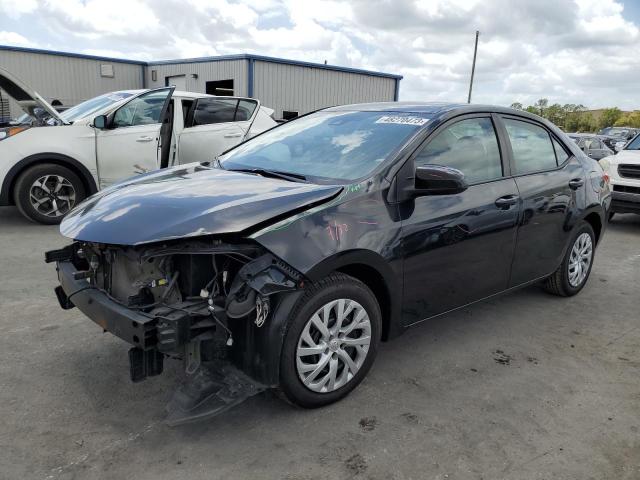 TOYOTA COROLLA L 2018 with VIN 5YFBURHE7JP848255 - Photo from auction