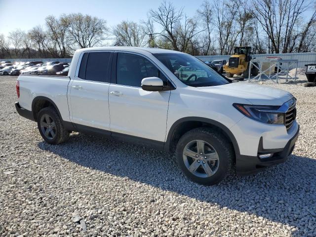 Photo 4 from auction – 2022 HONDA RIDGELINE with VIN 5FPYK3F58NB038609