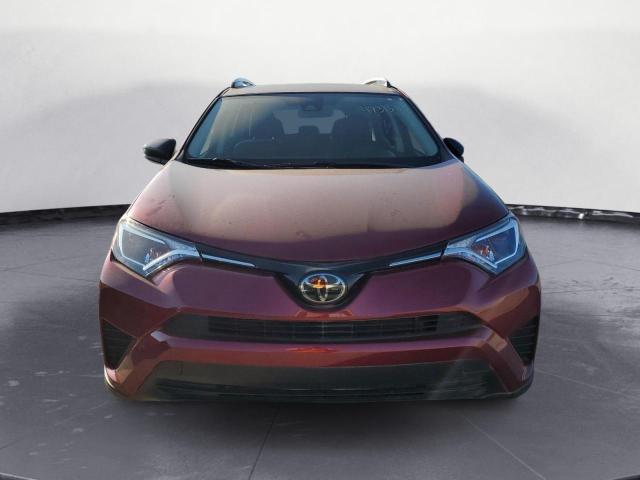 Photo 5 from auction – 2018 TOYOTA RAV4 LE with VIN JTMZFREV3JD121033