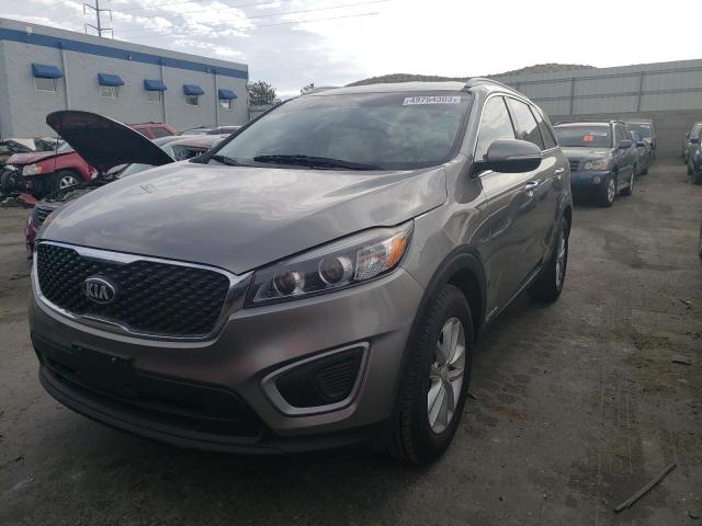 KIA SORENTO LX 2016 with VIN 5XYPGDA5XGG135339 - Photo from auction