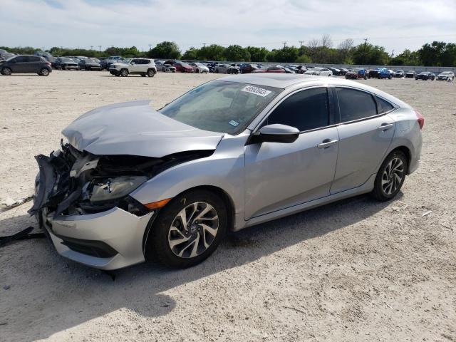 HONDA CIVIC EX 2018 with VIN 19XFC2F79JE011363 - Photo from auction