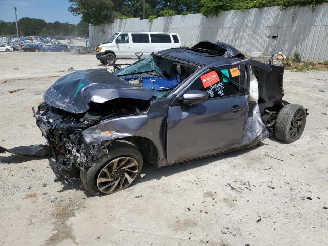 HONDA CIVIC EX 2018 with VIN 19XFC2F75JE036471 - Photo from auction