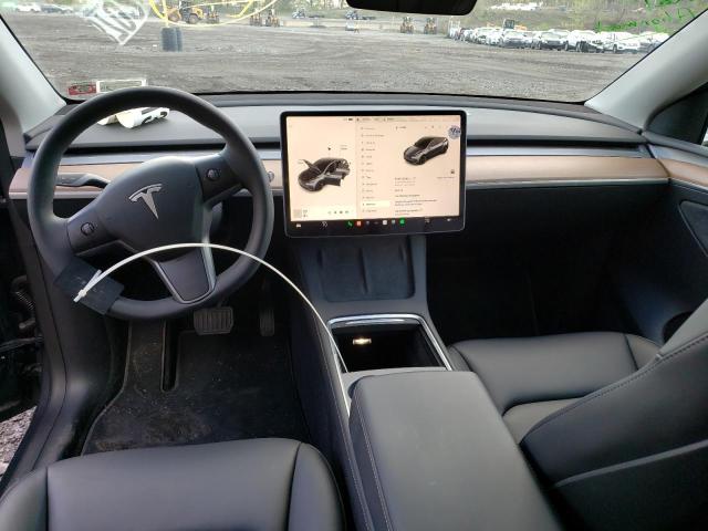 Photo 8 from auction – 2023 TESLA MODEL Y with VIN 7SAYGAEE7PF628581