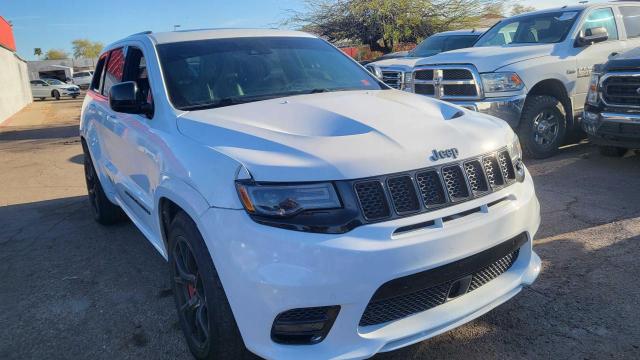 JEEP GRAND CHER 2017 with VIN 1C4RJFDJ4HC689349 - Photo from auction