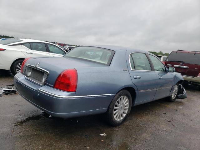 Photo 3 from auction – 2004 LINCOLN TOWN CAR E with VIN 1LNHM81W44Y612147