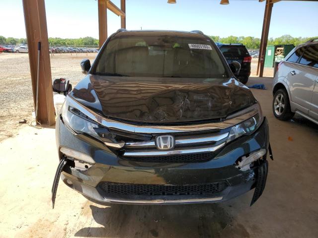 Photo 5 from auction – 2016 HONDA PILOT TOUR with VIN 5FNYF5H99GB051977