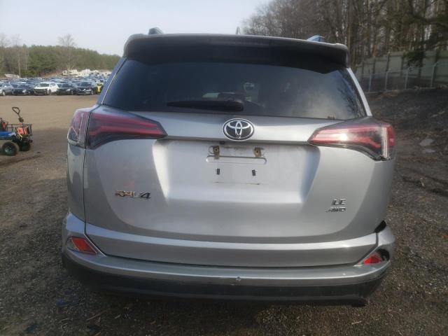 Photo 6 from auction – 2018 TOYOTA RAV4 LE with VIN 2T3BFREV5JW814447