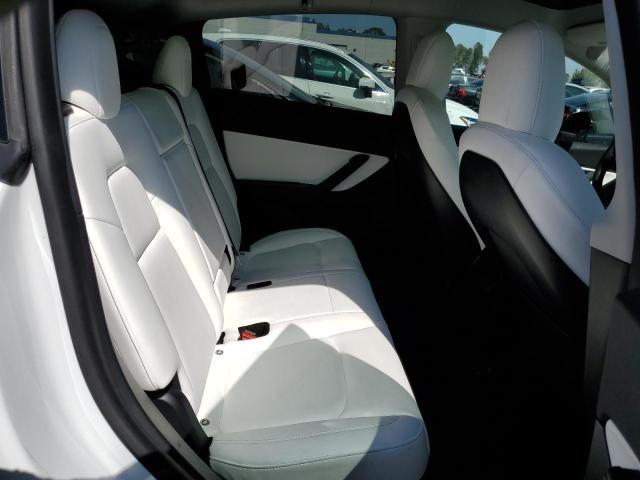Photo 11 from auction – 2021 TESLA MODEL Y with VIN 5YJYGDEE9MF282561