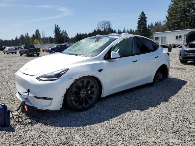 TESLA MODEL Y 2023 with VIN 7SAYGAEE8PF624197 - Photo from auction