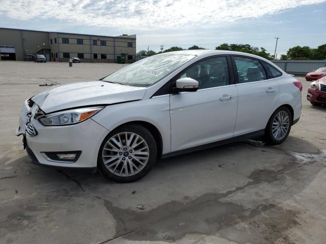 FORD FOCUS TITA 2016 with VIN 1FADP3J27GL327637 - Photo from auction