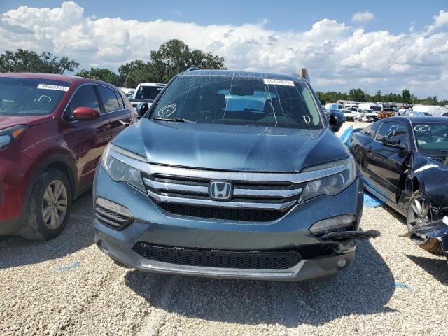 Photo 5 from auction – 2017 HONDA PILOT TOUR with VIN 5FNYF5H92HB020233