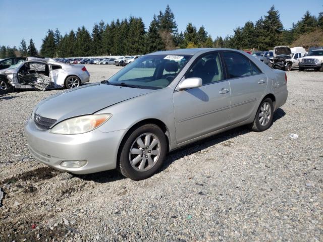 TOYOTA CAMRY LE 2003 with VIN JTDBE30K830169216 - Photo from auction