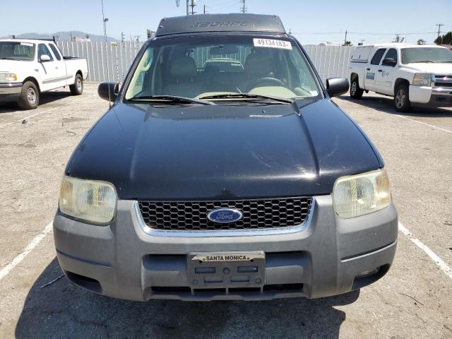 Photo 5 from auction – 2003 FORD ESCAPE XLT with VIN 1FMYU93173KB55407