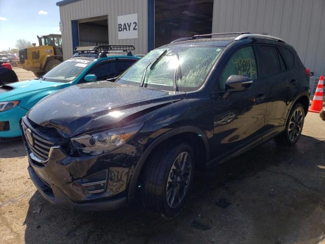 MAZDA CX-5 GT 2016 with VIN JM3KE4DY8G0827327 - Photo from auction