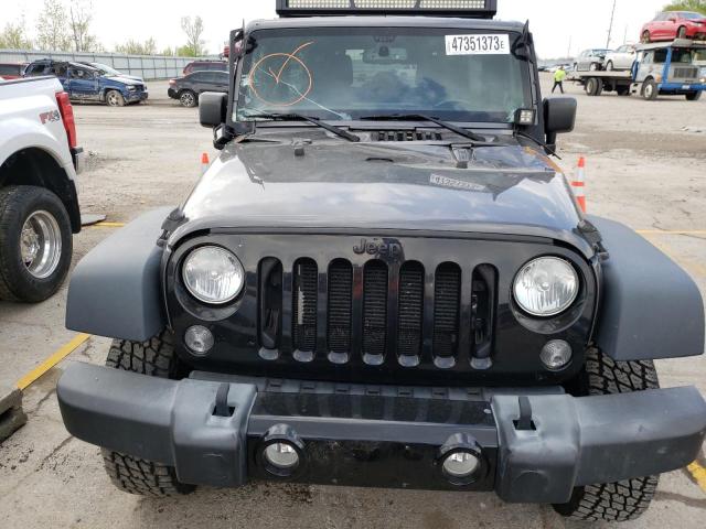 Photo 5 from auction – 2014 JEEP WRANGLER U with VIN 1C4BJWDG3EL225681