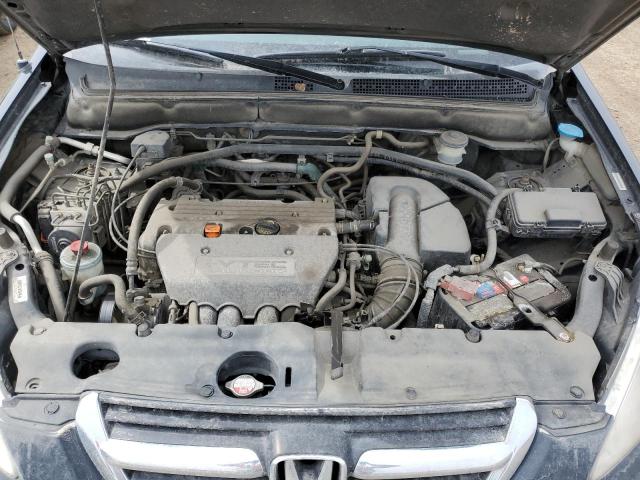 Photo 12 from auction – 2002 HONDA CR-V LX with VIN JHLRD784X2C817637