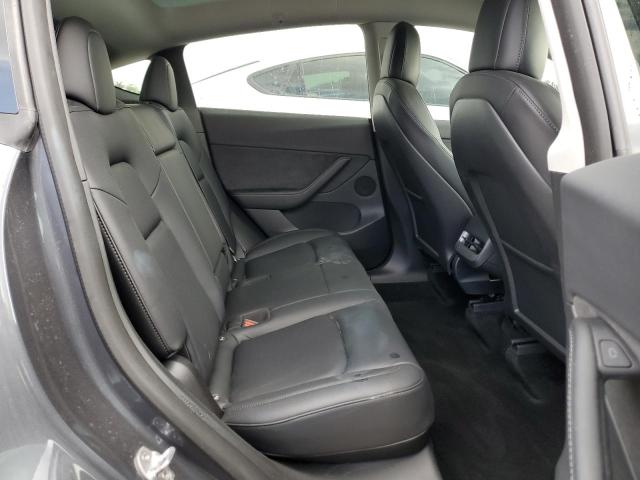 Photo 11 from auction – 2022 TESLA MODEL Y with VIN 7SAYGDEF3NF374147