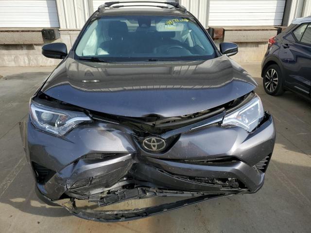 Photo 5 from auction – 2018 TOYOTA RAV4 LE with VIN 2T3BFREV0JW755503