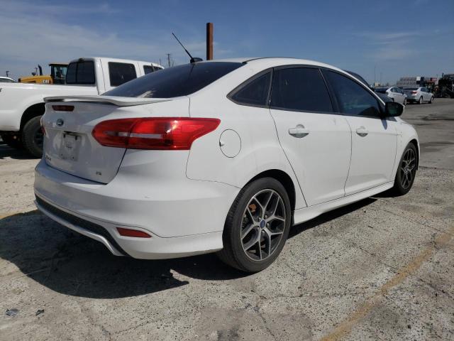 Photo 3 from auction – 2016 FORD FOCUS SE with VIN 1FADP3F24GL216214