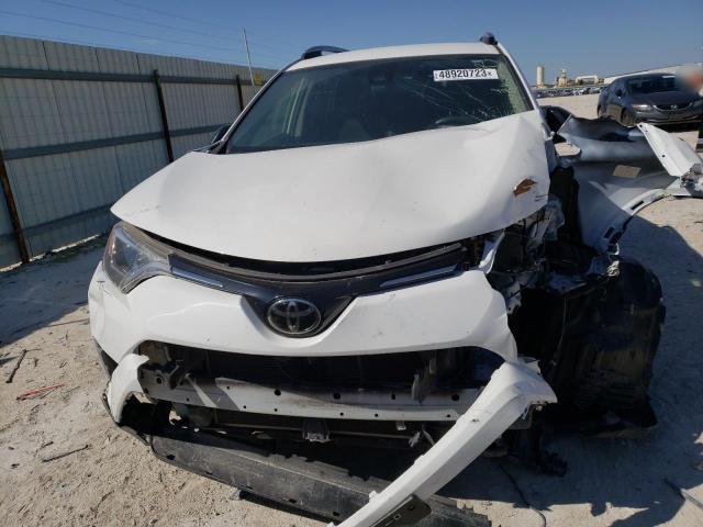 Photo 5 from auction – 2017 TOYOTA RAV4 LE with VIN JTMZFREV6HJ124679