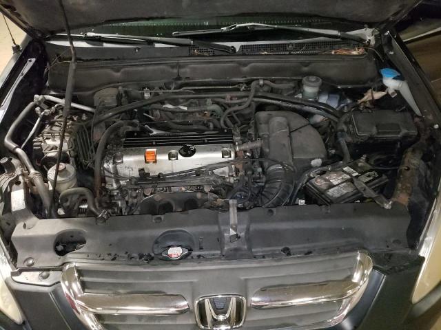 Photo 12 from auction – 2002 HONDA CR-V EX with VIN JHLRD78892C014336