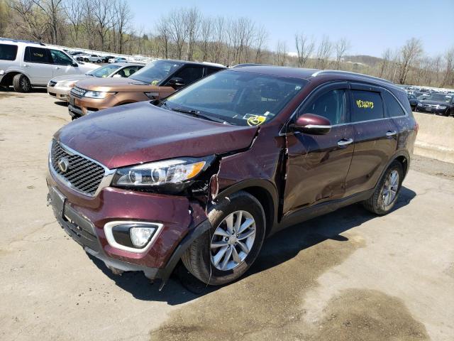 KIA SORENTO LX 2018 with VIN 5XYPGDA37JG429156 - Photo from auction
