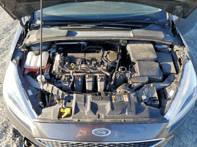 Photo 11 from auction – 2015 FORD FOCUS SE with VIN 1FADP3F20FL221053