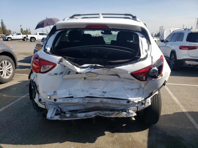 Photo 6 from auction – 2014 MAZDA CX-5 TOURI with VIN JM3KE2CY0E0336866