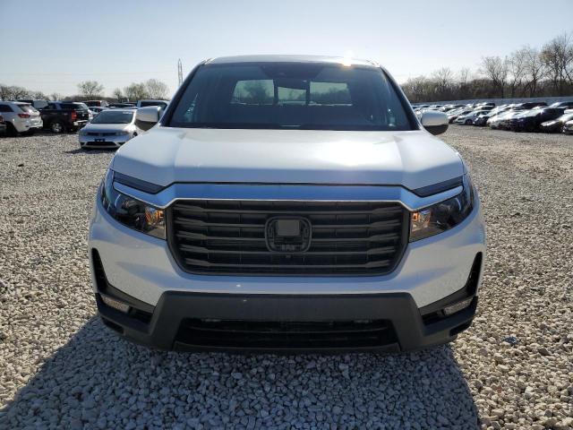 Photo 5 from auction – 2022 HONDA RIDGELINE with VIN 5FPYK3F58NB038609
