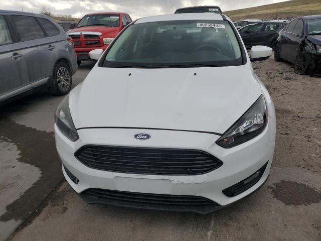 Photo 5 from auction – 2018 FORD FOCUS SE with VIN 1FADP3FEXJL235447