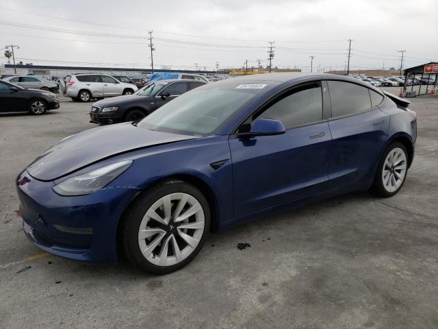 TESLA MODEL 3 2021 with VIN 5YJ3E1EAXMF069582 - Photo from auction